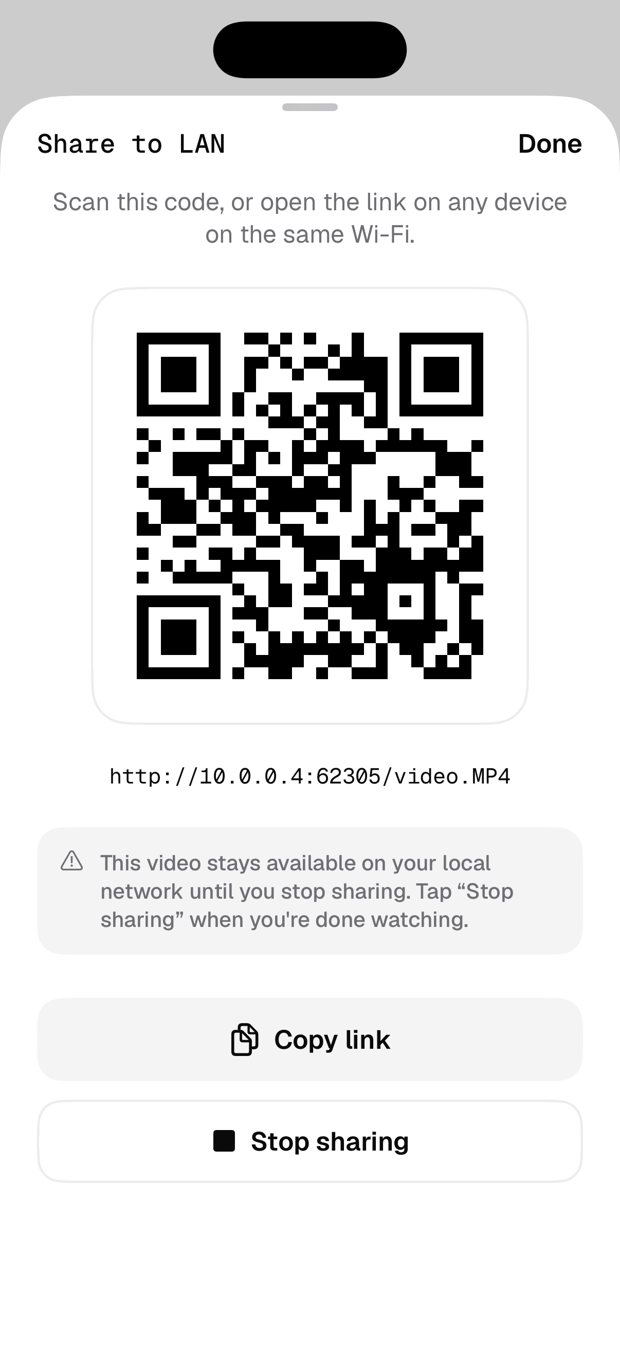 A Share to LAN sheet with a QR code and a local streaming link